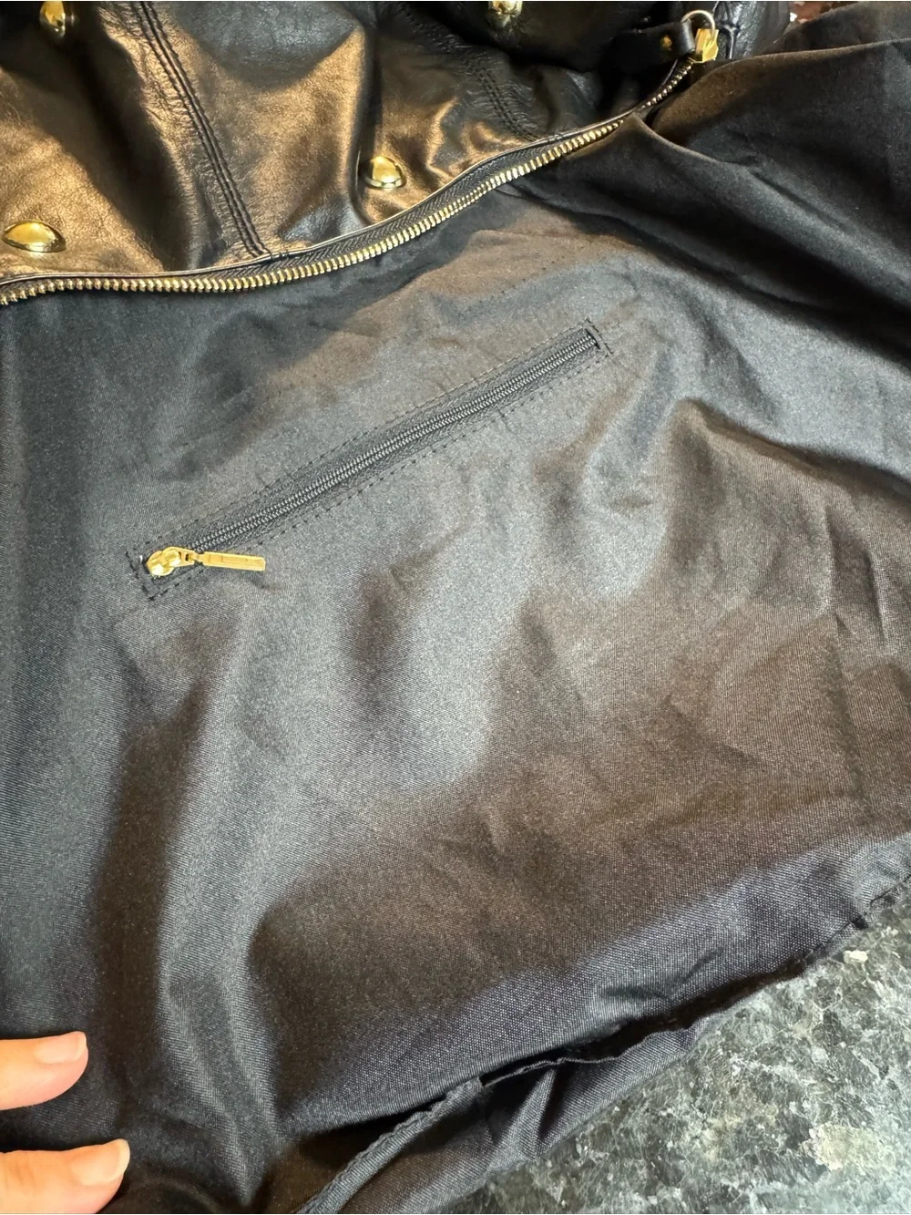 Chevignon Leather Black  Hobo with Gold Studded accents .